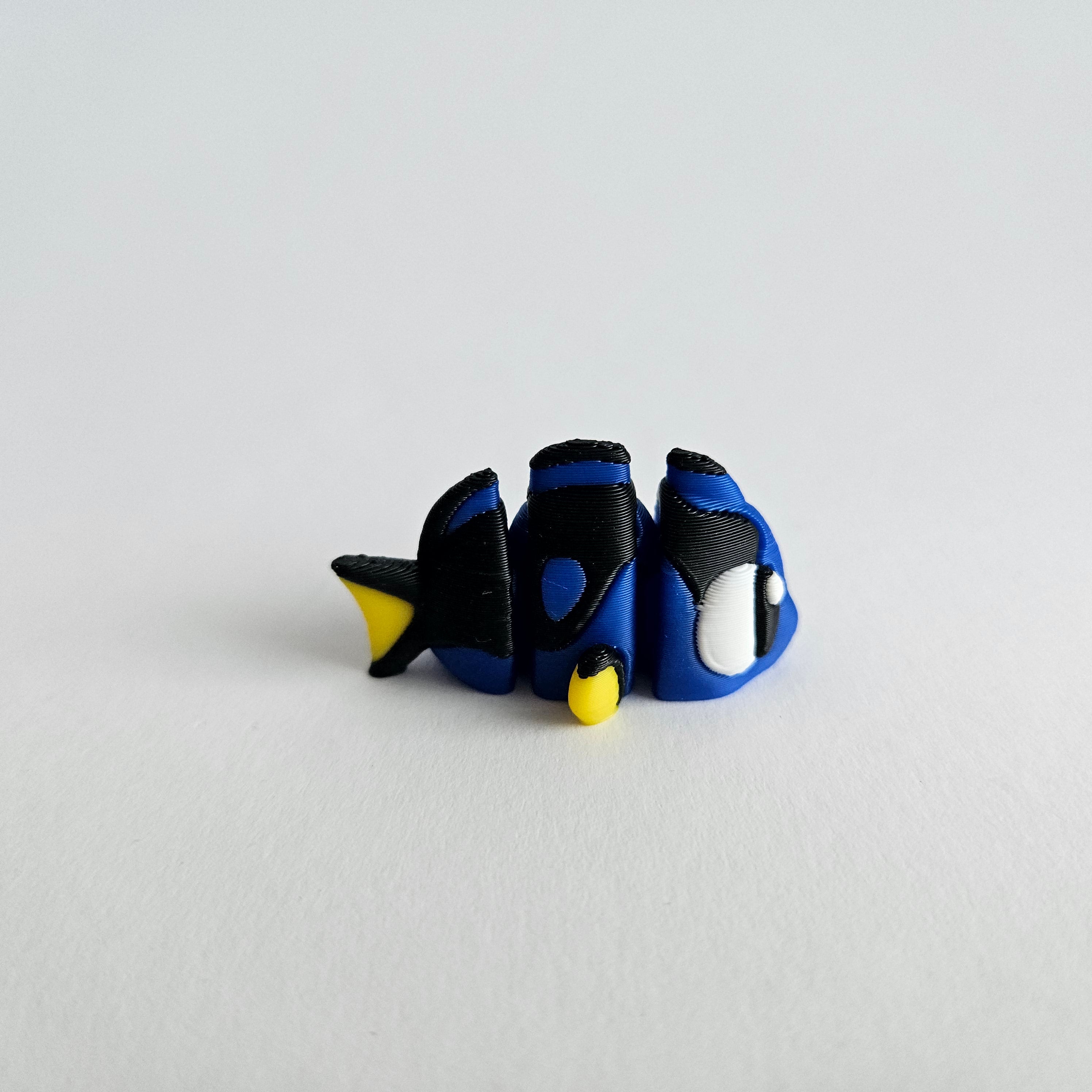 Bluppy der bewegliche blaue Fisch
